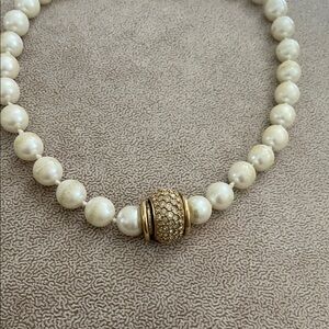 Elegant Pearl Necklace with Gold Accents
